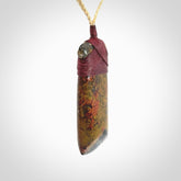 Hand carved Brecciated Jasper Toki Pendant.